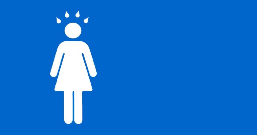 The international icon for women's room, with sweat emerging from her head.