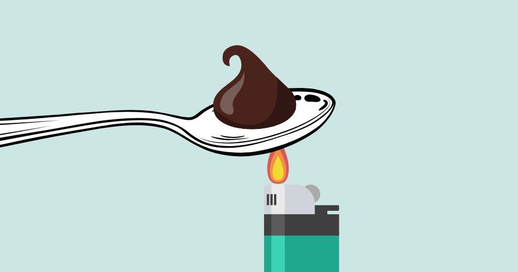 A Hershey's Kiss is heated on a spoon with a cigarette lighter